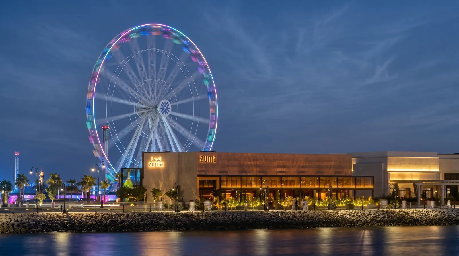 Restaurant photography in Doha: Zuma terrace at blue hour with the Ferris wheel